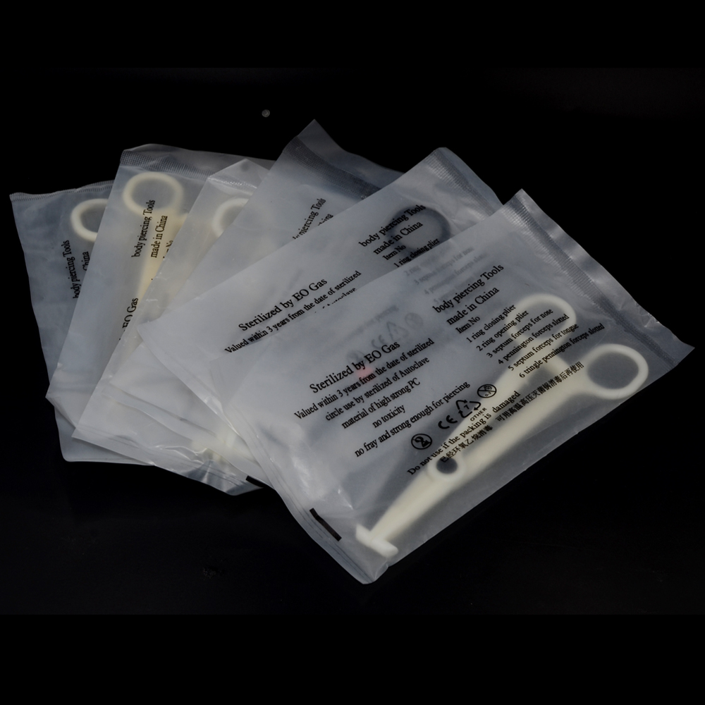 1PC Acrylic Piercing Clamp Ear - Body Jewelry Ring Opening Pliers recension och pris