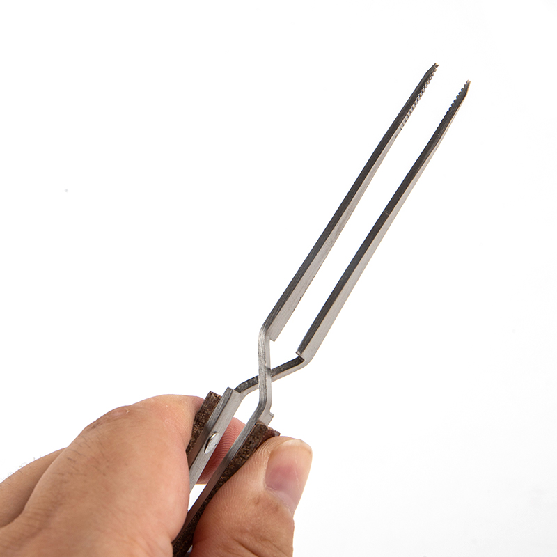 Stainless Steel Cross Locking  - Body Jewelry Tool recension och pris