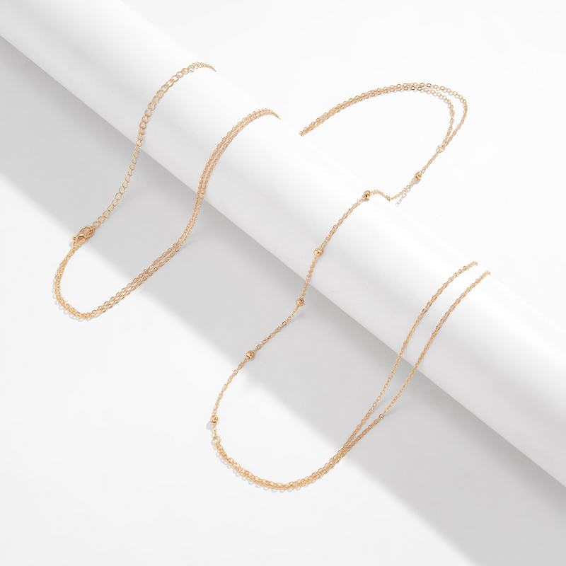 Simple Cross Chest Breast Bell - Body Jewelry Chain recension och pris